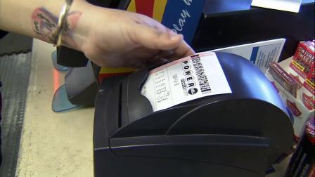 A Powerball ticket is printed at a convenience store in Ehrenberg, Ariz., on Wednesday, Nov 28, 2012.