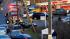 Emergency vehicles line the road at a firehouse...