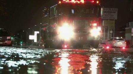 A fire truck is seen on a flooded South Los Angeles street on Thursday, Dec. 27, 2012.