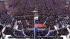 A crowd fills the National Mall at the...