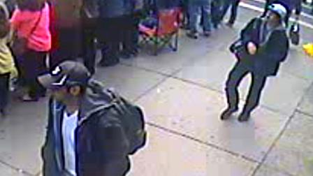 This image from surveillance video released Thursday, April 18, 2013 by the FBI shows two suspects sought in connection with the Boston Marathon bombings.