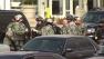 Officers search for the second suspect in the Boston Marathon bombing on Friday, April 19, 2013.