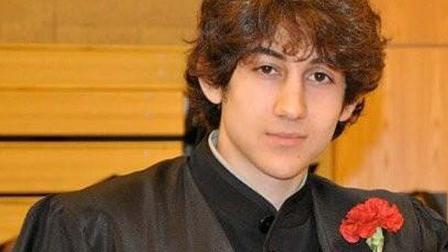In this undated photo provided by Robin Young, Dzhokhar A. Tsarnaev poses for a photo after graduating from Cambridge Rindge and Latin High School.