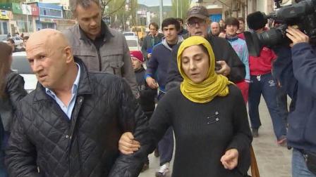 Zubeidat Tsarnaev (right), the mother of the Boston Marathon bombing suspects, in a photo from April 2013.