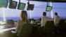 Air traffic controllers appear in this undated file photo.