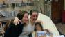 Amanda Berry, center, poses for a picture at a hospital after being rescued on Monday, May 6, 2013, in this photo provided by family.