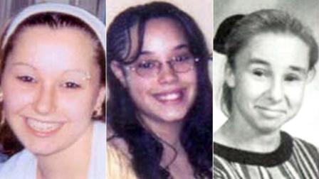 Undated handout photos provided by the FBI show Amanda Berry, left, and Georgina Gina Dejesus, center. Michelle Knights 1998 freshman year high school picture, right, at James Ford Rhodes High School in Cleveland, Ohio.