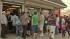 People lined up Saturday at Blue Bird Liquor in Hawthorne to buy Powerball tickets.