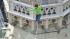 A man makes the first tightrope walk between the two towers of St. Stephens Cathedral in Austria.