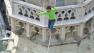 A man makes the first tightrope walk between the two towers of St. Stephens Cathedral in Austria.