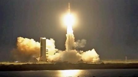 A communications satellite is seen being launched into space from Cape Canaveral Friday, May 24, 2013.