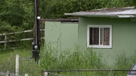 The exterior of a home is seen where a man allegedly left a baby in the freezer.
