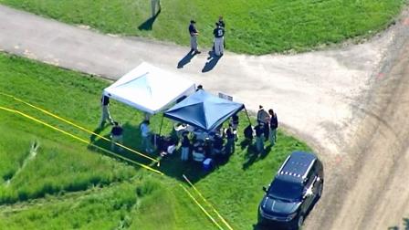 The FBI searches a field in Oakland Township, Mich., for the body of Teamsters boss Jimmy Hoffa on Monday, June 17, 2013.