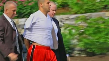 New England Patriots tight end Aaron Hernandez is seen being taken from his home in handcuffs on Wednesday, June 26, 2013.