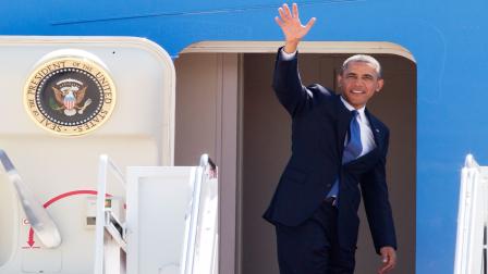 President Barack Obama waves as he boards Air Force One leaving Andrews Air Force Base, Md., en route to Chattanooga, Tenn., on Tuesday, July 30, 2013.