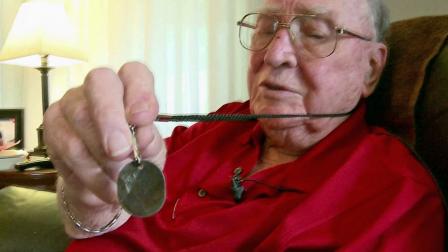 Jahue Mundy, 92, is reunited with his dog tags that vanished 67 years ago.