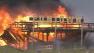 A fire rages at Funtown Pier Amusement Park on the boardwalk in Seaside Heights, N.J., Sept. 12, 2013.