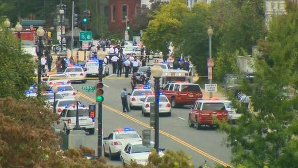Police respond to reports of shots fired outside the U.S. Capitol on Thursday, Oct. 3, 2013.