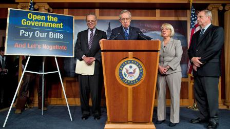 Senate Majority Leader Sen. Harry Reid, D-Nev., center, pauses during a news conference with, from left, Sen. Chuck Schumer, D-N.Y., Reid, Sen. Patty Murray, D-Was., and Sen. Dick Durbin, D-Ill., on Saturday, Oct. 12, 2013 in Washington.