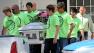 Pallbearers wearing anti-bullying t-shirts carry the casket of Rebecca Sedwick, 12, to a waiting hearse as they exit the Whidden-McLean Funeral Home Monday, Sept. 16, 2013, in Bartow, Fla.