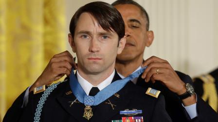 President Barack Obama awards the Medal of Honor to former Army Capt. William D. Swenson of Seattle, Wash., during a ceremony in the East Room at the White House in Washington, Tuesday, Oct. 15, 2013.