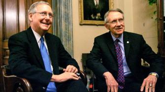 Senate majority leader Harry Reid and Senate minority leader Mitch McConnell talk during a photo opportunity on Capitol Hill, Nov. 15, 2006, in Washington.