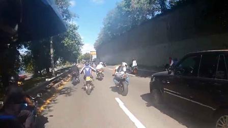 A still image from video footage shows a confrontation between a group of bikers and an SUV in New York City on Sunday, Sept. 29, 2013.