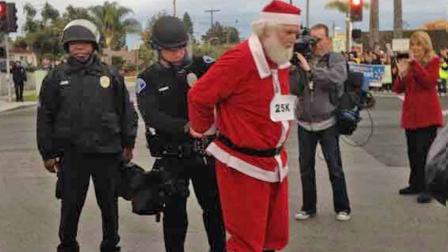 Ten people, including a man dressed as Santa Claus, were arrested for failure to disperse at a protest held in front of a Wal-Mart store on the 1300 block of Mountain Avenue in Ontario Friday, Nov. 29, 2013.