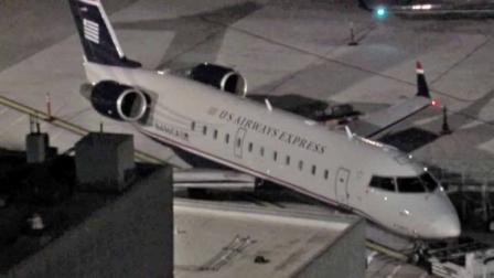 US Airways flight 2846 operated by Mesa Air landed at Sky Harbor International Airport in Phoenix, Arizona Saturday, Nov. 30, 2013.