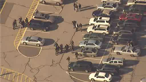 The scene outside Sandy Hook Elementary School in Newtown, Conn., following a mass shooting on Friday, Dec. 14, 2012.