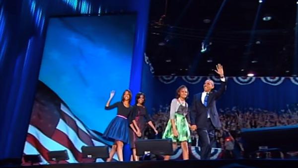President Barack Obama appears on stage with wife, Michelle, and daughters Sasha and Malia, before the president's victory speech at election headquarters in Chicago on Wednesday, Nov. 7, 2012.