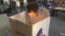 A man casts his ball ballot on Election Day in the city of Los Angeles on Tuesday, May 21, 2013.