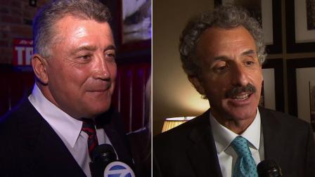 Carmen Trutanich, left, and Mike Feuer, right, talk to Eyewitness News on Election Day on Tuesday, May 21, 2013.