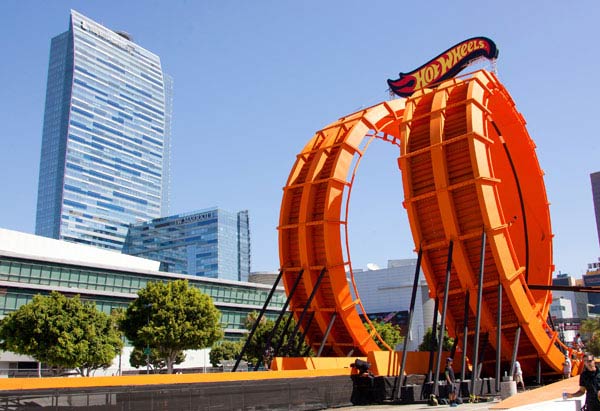 Team Hot Wheels green driver Greg Tracy and yellow driver Tanner Foust set a Guinness World Records Title by successfully racing through a 60-foot-tall double vertical loop at the X Games Los Angeles on Saturday June 30, 2012 in Los Angeles.
