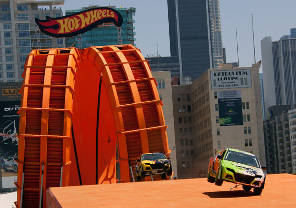 Team Hot Wheels green driver Greg Tracy and...