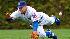 Former Cubs center fielder Reed Johnson missees a fly ball.