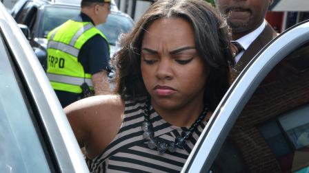 Shayanna Jenkins, fiancee of former New England Patriots player Aaron Hernandez gets into her car outside superior court Friday, Sept. 6, 2013, after Hernandez was arraigned in Fall River, Mass.