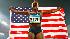Sheena Tosta celebrates with the U.S. flag