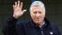 New York Yankees owner George Steinbrenner waves...