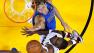 Miami Heats Chris Bosh, right, goes up to shoot over Dallas Mavericks Dirk Nowitzki, left,of Germany during the second half in Game 1 of the NBA Finals in Miami, May 31, 2011.