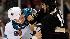 San Jose Sharks left wing Frazer McLaren brawls with Anaheim Ducks right wing George Parros.