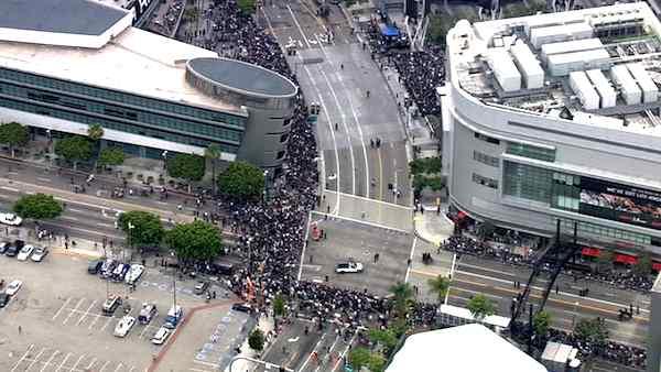 Hockey fans crowd downtown Los Angeles to celebrate the L.A. Kings' first-ever Stanley Cup win in a victory parade on Thursday, June 14, 2012.