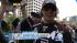 Los Angeles Kings center Anze Kopitar rides atop...