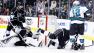 Los Angeles Kings goalie Jonathan Quick stops a shot on goal by San Jose Sharks Patrick Marleau (12) as Kings Drew Doughty, left, and Robyn Regehr defend in Los Angeles, Tuesday, May 14, 2013.