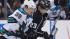 San Jose Sharks center Logan Couture (39) and Los Angeles Kings right wing Dustin Brown (23) fight for the puck during the third period in Game 5 of the Western Conference semifinals Thursday, May 23, 2013, in Los Angeles.
