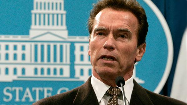 In this file photo from Dec. 10, 2008, Former Gov. Arnold Schwarzenegger calls on state lawmakers to settle their differences and reach a solution to the growing state budget deficit during a Capitol news conference in Sacramento, Calif.