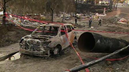 This photo shows the charred aftermath a day after a massive fire roared through a neighborhood in San Bruno, Calif. on Thursday, Sept. 9, 2010.