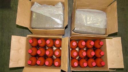 Officials arrested a man at the Otay Mesa cargo facility after finding about 2,330 pounds of marijuana in boxes of hot sauce.