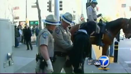 At least two officers were injured Monday when police clashed with Occupy protesters at the state Capitol.