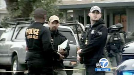 Law enforcement agents are shown near the scene where three Immigration Customs and Enforcement agents were shot while serving warrants in Petaluma near San Francisco on Thursday, May 3, 2012.